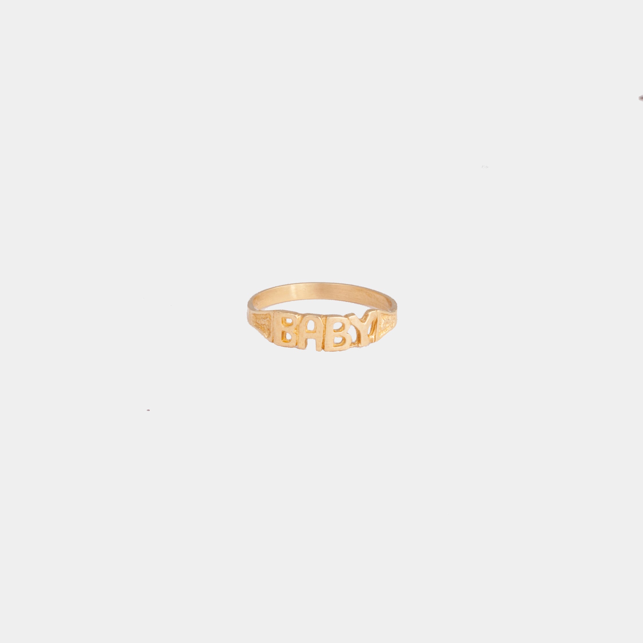 10K yellow gold baby ring with "baby" text