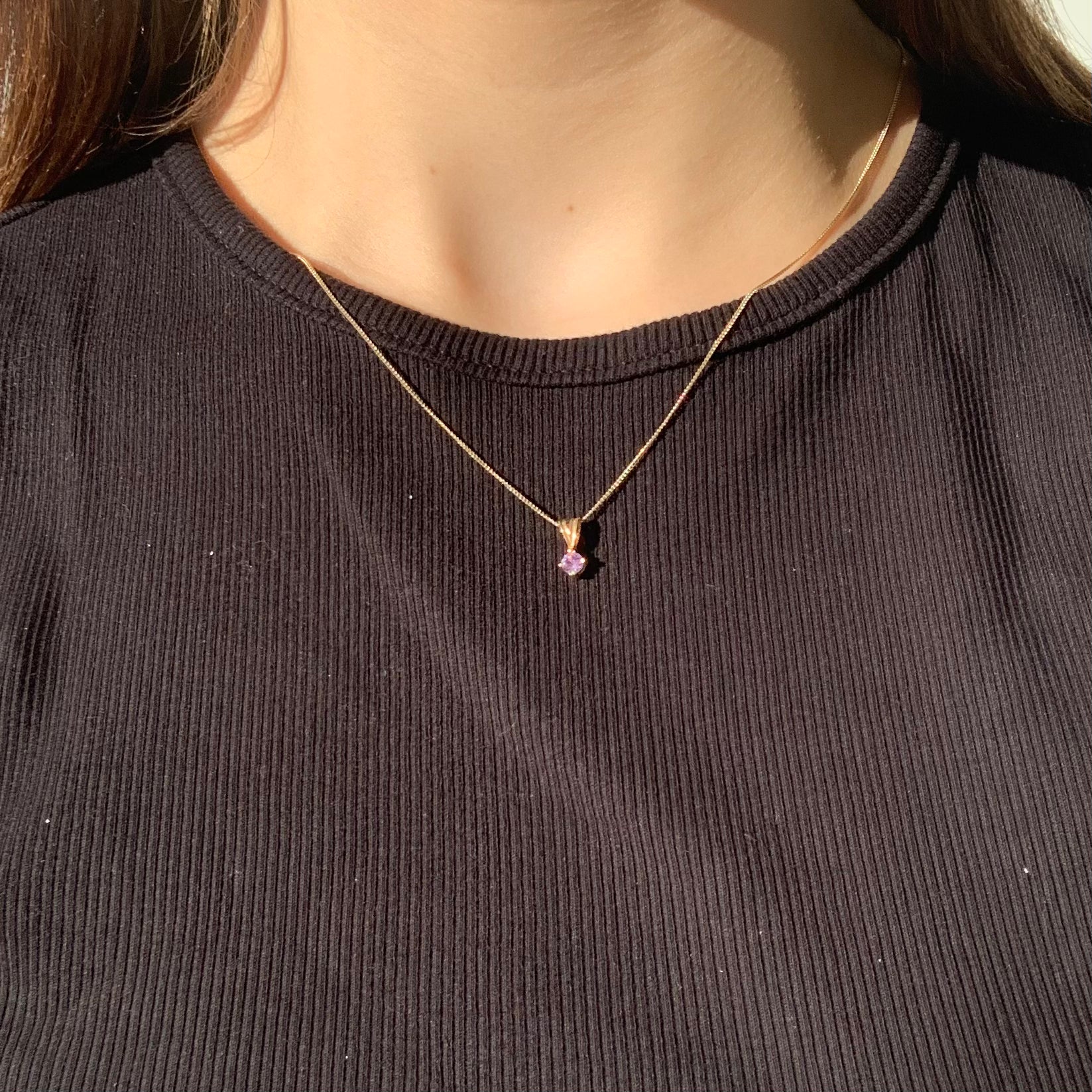 birthstone pendant on a thin curb chain